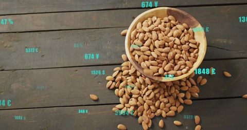 Almonds Spilling and Digital Currency Overlays on Rustic Table