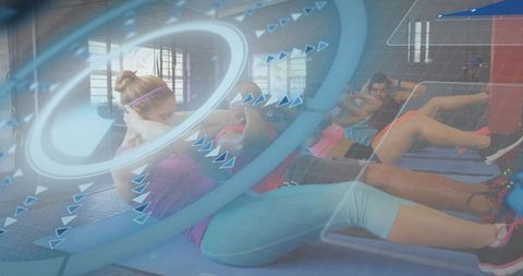 Crunching group doing abdominal workout in sunlit gym with futuristic blue overlay
