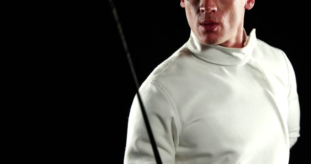 Man in Fencing Attire Holding Foil Ready for Match - Download Free Stock Images Pikwizard.com