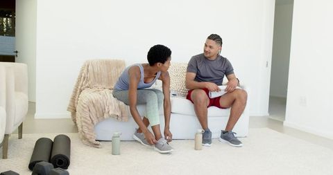 Couple Preparing for Home Workout in Modern Living Room