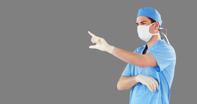 Surgeon in Operating Room Scrubs Pointing - Download Free Stock Images Pikwizard.com