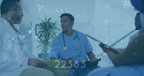 Medical Professionals Discussing with Digital Interface Overlay