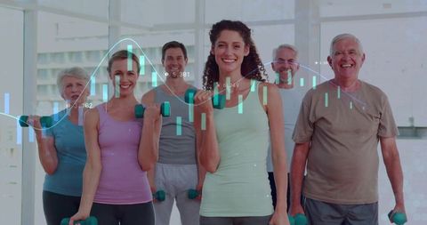 Fitness Group Smiling While Holding Dumbbells in Gym