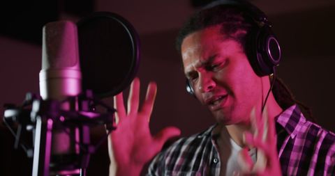 Passionate Singer Wearing Headphones Recording Music - Download Free Stock Images Pikwizard.com