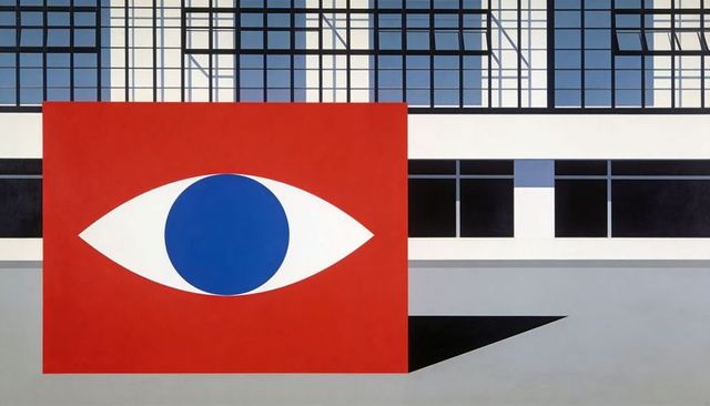 Minimalist red eye mural on cubic panel in modern plaza with grid glass facade