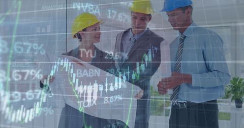 Engineers Analyzing Blueprints with Stock Market Graph Overlay - Download Free Stock Images Pikwizard.com