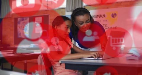 Teacher and student engaged in classroom technology