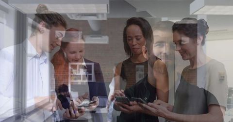 Professionals Collaborating with Technology in Modern Workspace