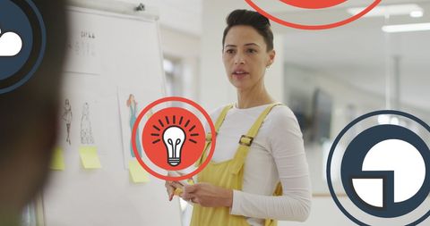 Innovative Businesswoman in Office with Digital Icons Overlay