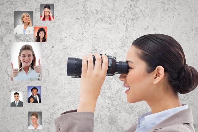 Digital composite of Digital composite image of HR looking at candidates through binoculars