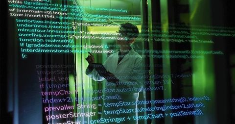 Mature Korean engineer pointing at holographic code in neon datacenter lab with tablet
