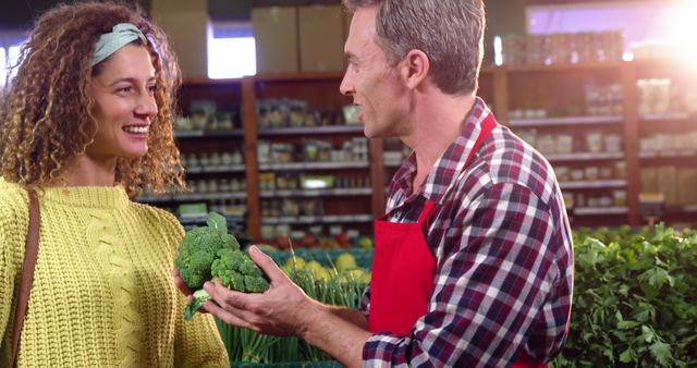 Friendly Grocery Store Interaction Buying Fresh Vegetables - Download Free Stock Images Pikwizard.com