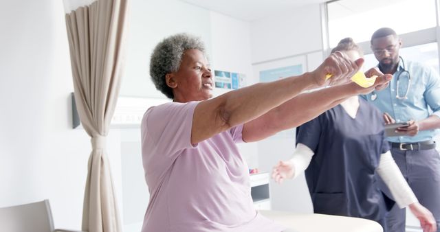 Senior Woman Participating in Physical Therapy at Clinic - Download Free Stock Images Pikwizard.com