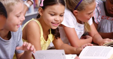 Children Happily Reading Books in School Library - Download Free Stock Images Pikwizard.com