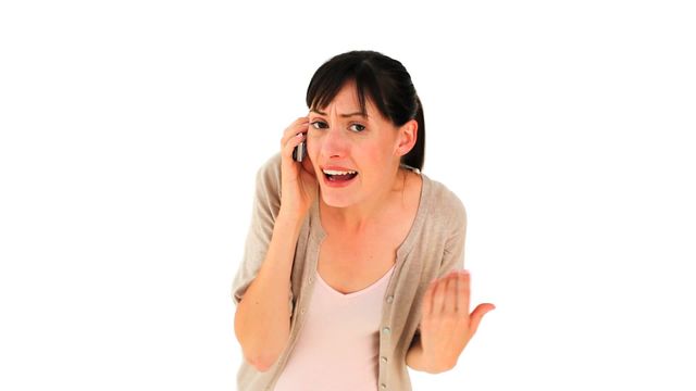 This video is ideal for depicting emotional reactions during phone conversations. Useful for articles or campaigns related to communication, customer service, stress management, or personal experiences. The neutral white background makes it adaptable for various professional and personal applications.