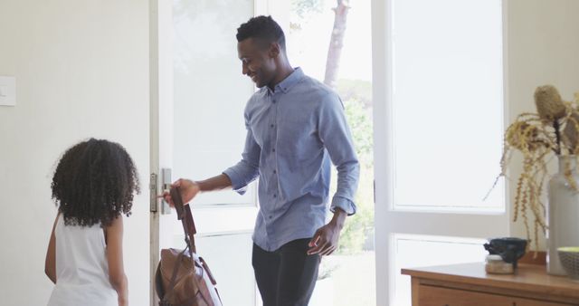 Father Arriving Home Greeted by Daughter at Door - Download Free Stock Images Pikwizard.com