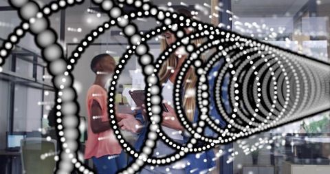 Holding tablet and collaborating in modern office with abstract dotted ring overlay