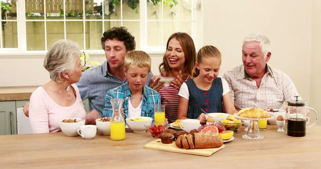 Intergenerational Family Enjoying Breakfast Together - Download Free Stock Images Pikwizard.com