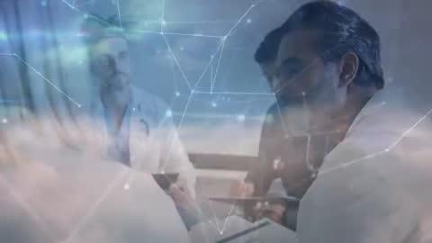 Doctors Holding Consultation with Digital Health Data Visualization