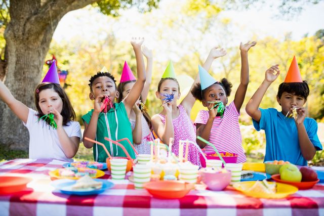 Cute children having fun during a birthday party - Download Free Stock Photos Pikwizard.com