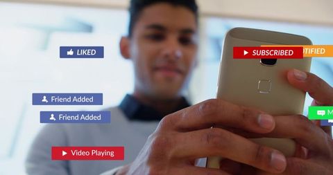 Man holding smartphone and tapping screen with social media notifications and UI overlays