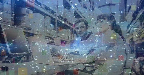 Couple using computer with global digital connections overlay