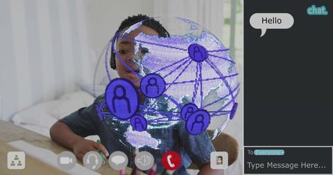 Boy wearing headset drawing with holographic globe during virtual learning call