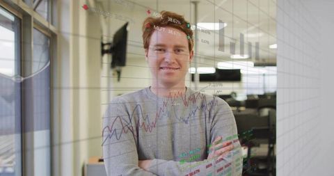 Professional analyst in modern office with financial data visualization