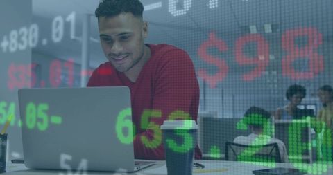 Businessman Analyzing Stock Market Trends in Modern Office Environment