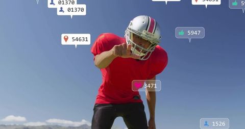 Pointing football player wearing helmet and red jersey with digital social media icons