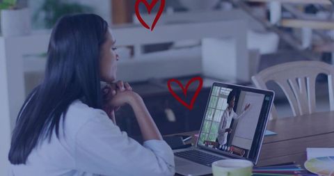 Professional woman engaged in remote work meeting from modern office