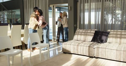 Diverse Group Attending Therapy Session in Bright Living Room
