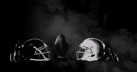 American Football Gear Showdown with Smoked Background - Download Free Stock Images Pikwizard.com