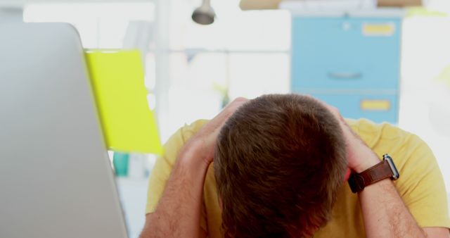 Stressed Man Head Down Facing Workload in Office - Download Free Stock Images Pikwizard.com