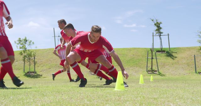 Football Players Practicing Drills Outdoors on Sunny Day - Download Free Stock Images Pikwizard.com