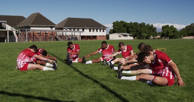 Youth Soccer Team Stretching on Grass Field before Training Session - Download Free Stock Images Pikwizard.com