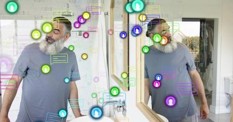 Mature bearded man standing at bathroom mirror surrounded by colorful digital chat overlays
