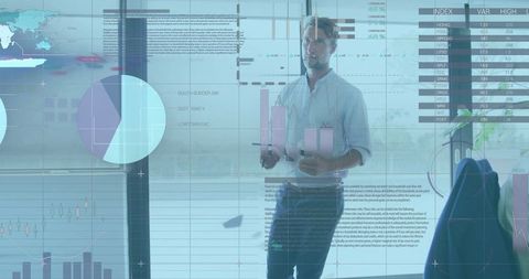 Businessman Analyzing Digital Statistics and Graphical Data