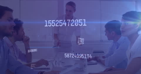 Business Professionals Analyzing Digital Data in Office Setting