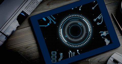 Digital Tablet with Futuristic Circuit Design on Screen