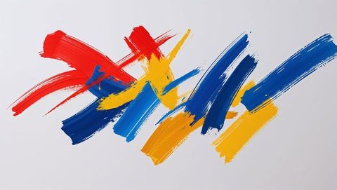 Vibrant brush strokes in red, yellow, and blue on canvas