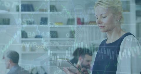 Businesswoman Analyzing Stock Market Data on Tablet