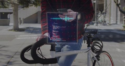 Urban commuter leaning on bicycle checking smartphone with augmented reality code waveform