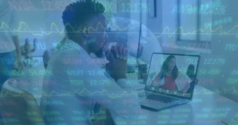 Entrepreneurs Analyzing Financial Data in Digital Work Environment