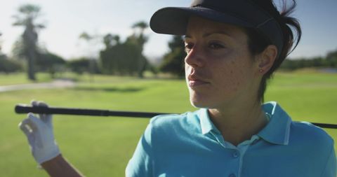 Confident Female Golfer Posing on Golf Course - Download Free Stock Images Pikwizard.com