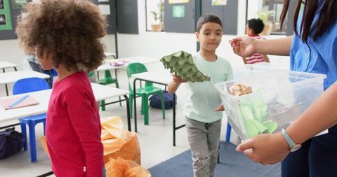 Kids Recycling with Teacher in Classroom Environment - Download Free Stock Images Pikwizard.com