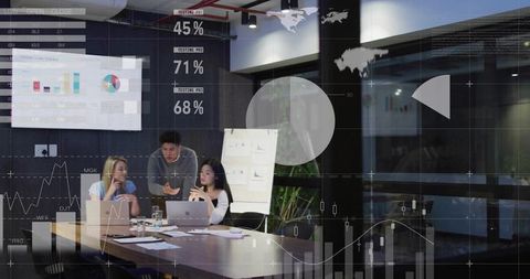 Team Analyzing Data with Corporate Charts Overlay in Modern Conference Room