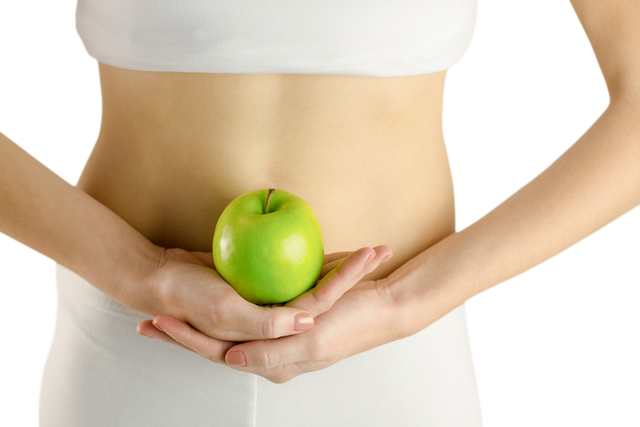 Transparent image of slim woman holding green apple symbolizing healthy diet - Download Free Stock Videos Pikwizard.com