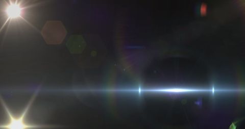 Dynamic Spotlight with Lens Flare on Dark Background - Download Free Stock Images Pikwizard.com