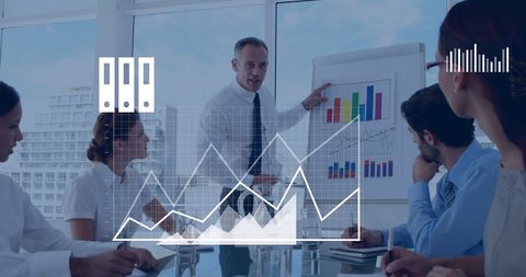 Business Team Analyzing Graphs in Modern Office